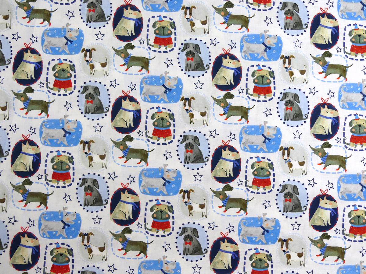 Patchworkstoff mit verschiedenen Hunden und Zicklein